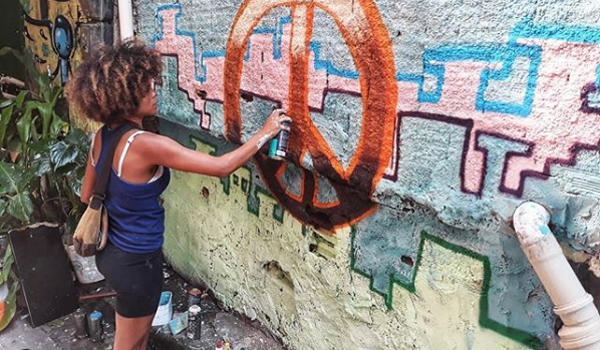 volunteer drawing wall painting