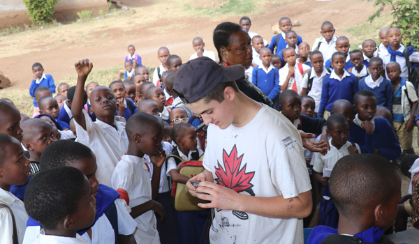 volunteer taking kids photos